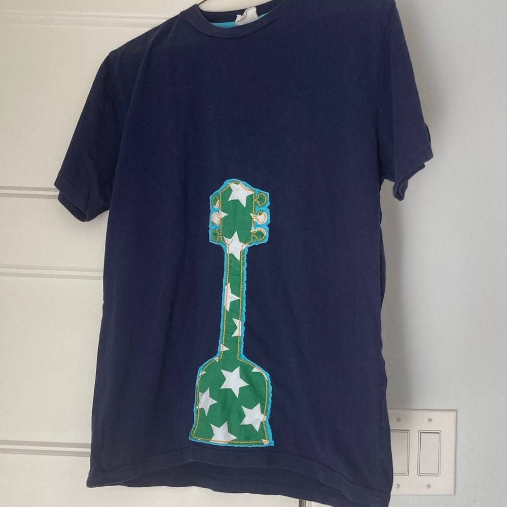 Boden Navy Tee with Green and White Guitar Design